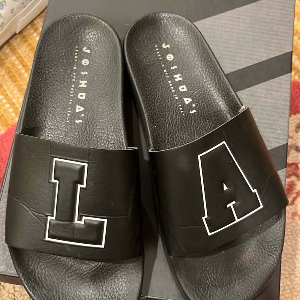 Joshua’s black slides size 38